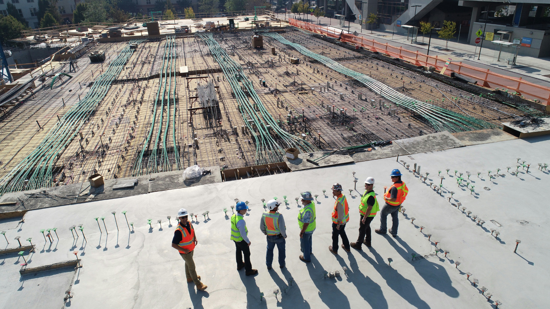 construction workers on a site construction site discussion a project